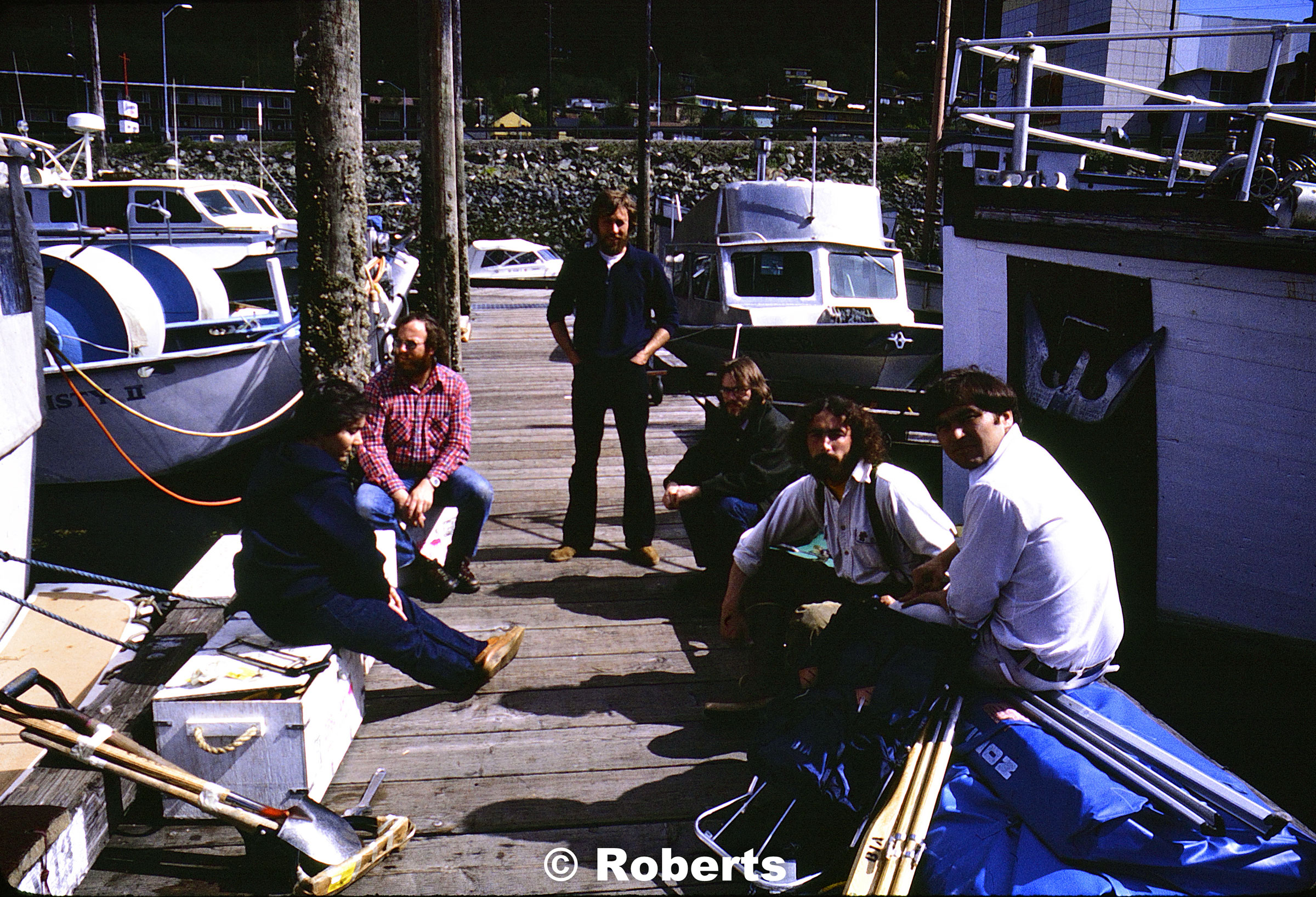 Southeast Alaska Field Survey Team (L to R): Carol Rawlinson, Russell Sackett, Larry Roberts, Larry Arden Woodall, Marquam George, and Peter Ekstrom. Harris Boat Harbor, Juneau, Alaska. May, 1979.